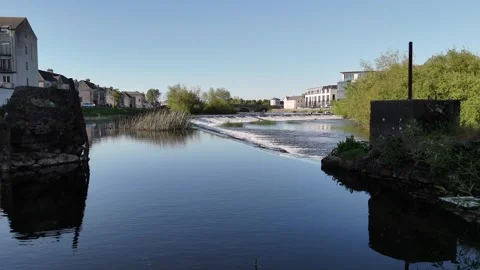 4K River Weir and Riverside Buildings in Carlow Ireland Stock Footage 333929842