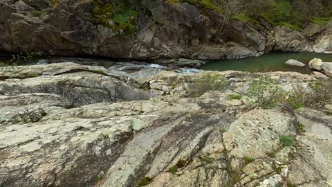 4K Riverside Path Walk - Dynamic Tracking Shot Along Mountain Stream &amp; Rocks Video stock 332147481