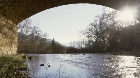 4K river,stream under old traditional stone bridge,rural nature,winter/fall. Stock Footage 62569894