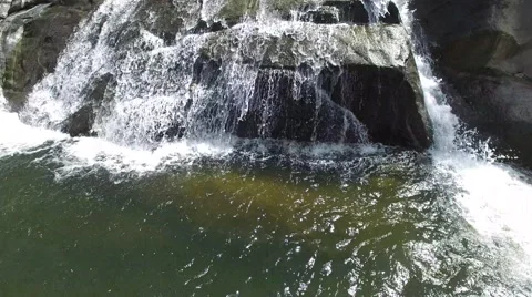 4K Rock Waterfall River Fly Over Stock Footage 63618151