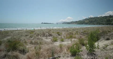 4K - Rolling Sand Dunes Meet Tropical Blue Water Stock Footage 225435157