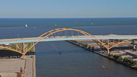 4K Rotating Aerial View Of Arch Bridge Over Milwaukee River Facing Lake Michigan Stock Footage 224655012