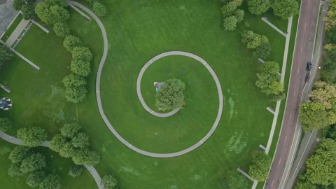 4K Rotating Aerial View of Hypnotic Spiral Path Gold Medal Park Minneapolis Stock Footage 220468710