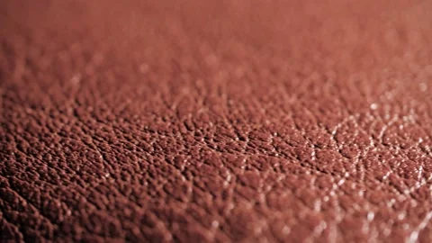 4K Rotating extreme close-up of real organic brown leather texture. Stock Footage 145198723