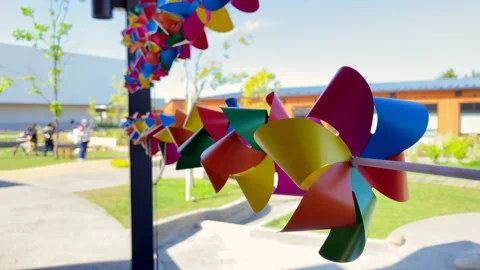 4K Rows of Colourful Pinwheels Spinning Stock Footage 155323921