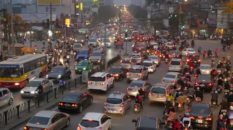 4K Rush hour in Vietnam, crowded traffic at intersection. High angle, long shot. Stock Footage 65830516