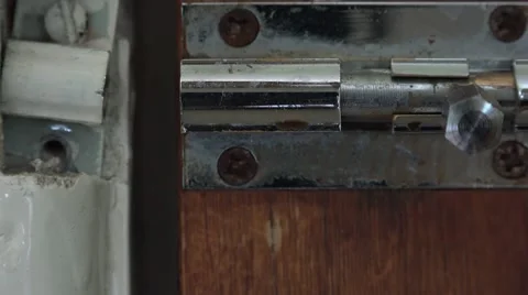 4k rusty old lock being bolted Stock Footage 47658520