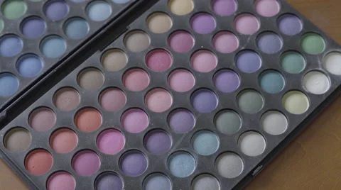 4K S-log 2 brush takes pinks and blues from multicoloured eyeshadow pallet Stock Footage 56526155