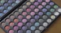 4K S-log 2 fake eyelashes placed on multicoloured eyeshadow pallet 4k or 4k+ Resolution
