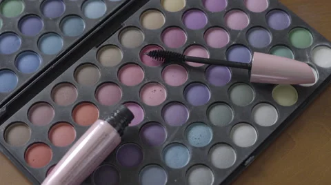4K S-log 2 Mascara brush on eye make up pallet picked up Stock Footage 56527025