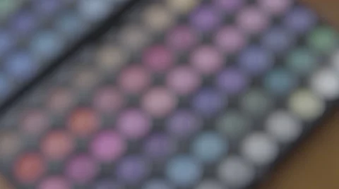 4K S-log 2 multicoloured eyeshadow pallet comes into focus Stock Footage 56525622