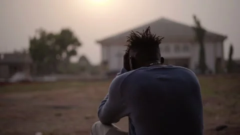 4k sad man staring at the sunset Stock Footage 238686716