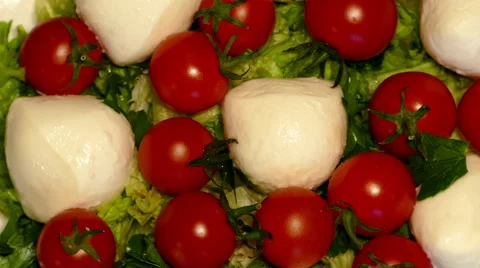 4k – Salad mozzarella with cherry tomatoes on plate 02 Stock Footage 56006429