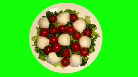 4k – Salad mozzarella with cherry tomatoes on plate Stock Footage 56249390