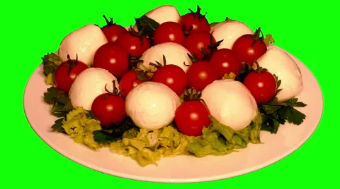 4k – Salad mozzarella with cherry tomatoes on plate Stock Footage 56775195