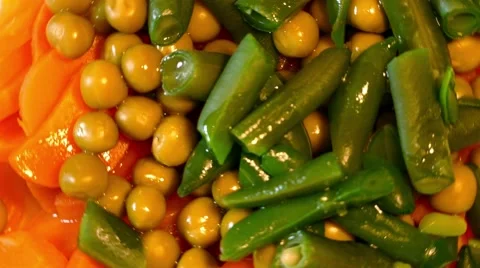 4k salad with string beans, carrot and green peas (close up) Stock Footage 49671073