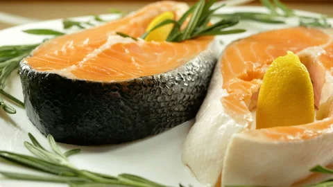 4K, Salmon. Raw Trout Red Fish Steak with Herbs and Lemon. Cooking Salmon, sea f Stock Footage 97959519