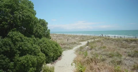 4K - Sandy Pathway Leads to Beautiful White Sand Beach Stock Footage 225431210