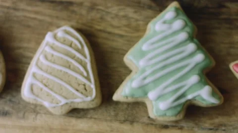 4K Santa and Bell Gingerbread Cookies Shown in Close Detail Stock Footage 342113728