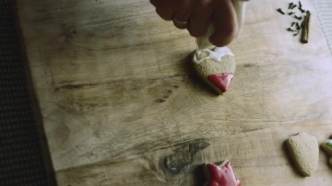 4K Santa Cookie Face Decorated Carefully from Above Stock Footage 342113584