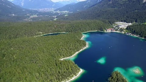 4K scenic flight of Eibsee in Bavaria on the bottom of Zugspitze Stock Footage 93083066