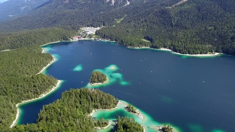 4K scenic flight of Eibsee in Bavaria on the bottom of Zugspitze Stock Footage 93083174