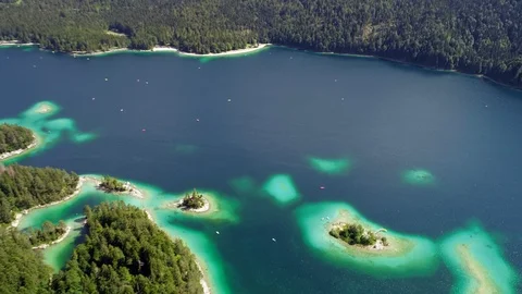 4K scenic flight of Eibsee in Bavaria on the bottom of Zugspitze Stock Footage 93083223