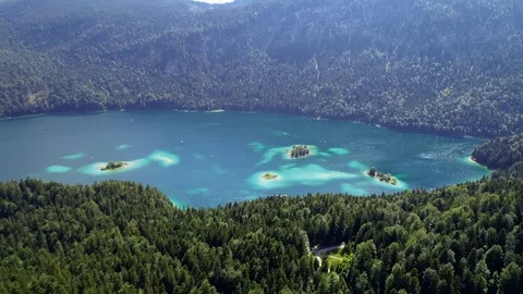 4K scenic flight of Eibsee in Bavaria on the bottom of Zugspitze Stock Footage 93083262
