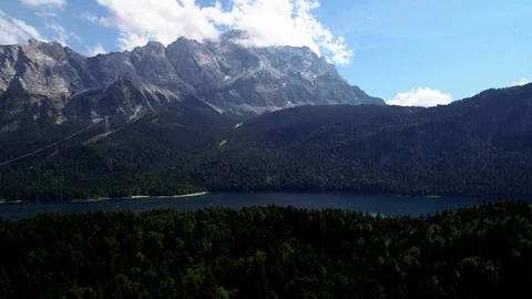 4K scenic flight of Eibsee in Bavaria on the bottom of Zugspitze Stock Footage 93083325