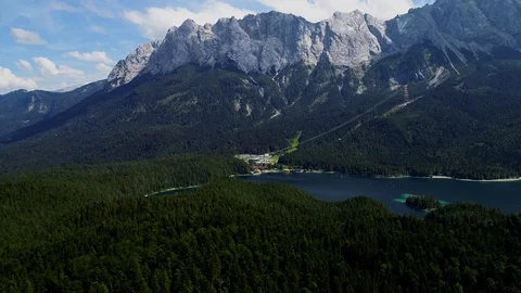 4K scenic flight of Eibsee in Bavaria on the bottom of Zugspitze Stock Footage 93083885