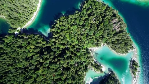 4K scenic flight of Eibsee in Bavaria on the bottom of Zugspitze Stock Footage 93084713