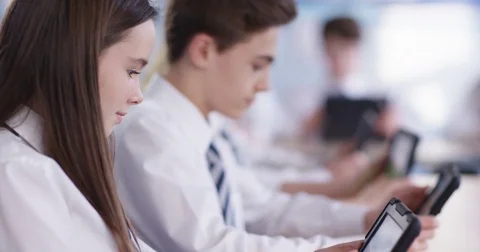 4k, School children with digital tablets in classroom. Slow motion. Stock Footage 73121014