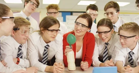 4k, School children using chemistry set during high school science experiment.  Stock Footage