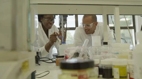 4K Science Lab and scientists working on cosmetics Stock Footage 67340793