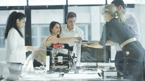 4K Scientific research engineers working in lab with computer &amp; 3D printer Stock Footage 67462837