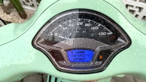 4K. Scooter. Key. Insert key. Green. Bali. Start. Engine. Arm. Scooter Key. Stock Footage 223550430