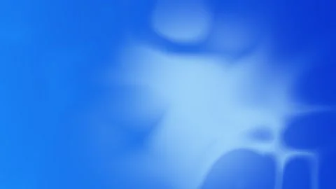 4K seamless loop background featuring soft blue gradients with abstract circular Stockbeeldmateriaal 309856075