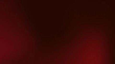 A 4K seamless loop background featuring a rich gradient of warm browns and reds Stock Footage 309955835
