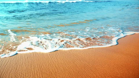 4K Seamless Looping Shot of Sand Beach, Gentle Turquoise Waves Stockbeeldmateriaal 61963528
