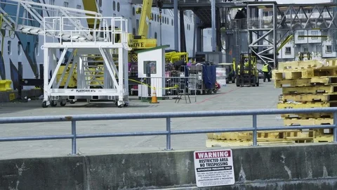 4K Seattle Washington crews loading cruise ship during day Stock Footage 73475831