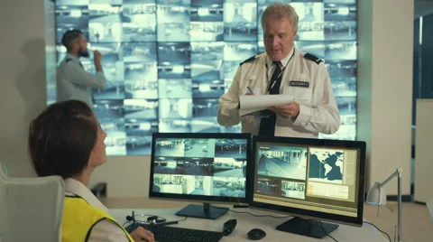 4K Security manager talking to staff in ... | Stock Video | Pond5