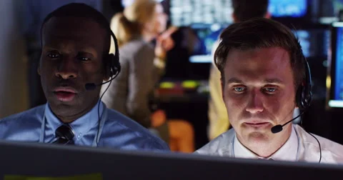4K Security &amp; surveillance team working in a busy system control room. Stock Footage 49623456