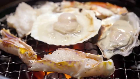 4K Shift Focus Charcoal grilled hokkaido hotate scallop Yakiniku Slow motion Stock Footage 144325119