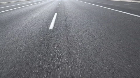 4K Shimmering Asphalt Old Lonely Empty Road Driving Close Up Stock Footage