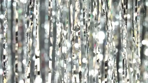 4K Shimmering Silver Tinsel Backdrop Metallic Reflective Strips Bokeh Video stock 332157173