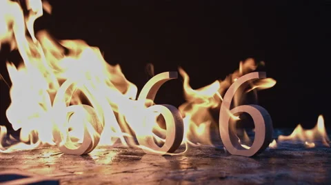 4k shoot of a creative composition with 666 numbers on fire Vídeos de archivo 64264432