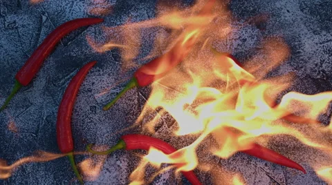 4k shoot of a creative composition with chilli peppers on fire Video stock 64263552