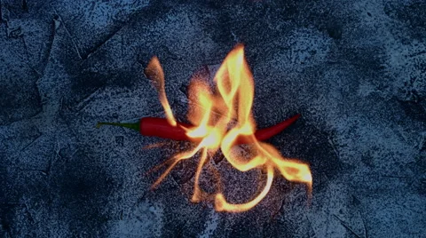 4k shoot of a creative composition with chilli pepper on fire Video stock 64266468