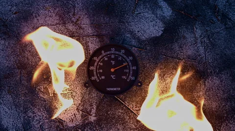 4k shoot of a creative composition with a thermometer on fire Stock Footage 64268661