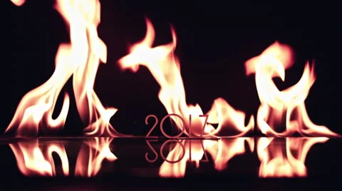 4k Shot of 2017 number Burning in Fire Flames Stock Footage 68299406